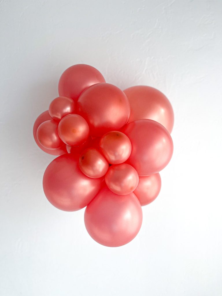 11" Tuftex Rojo - Paquete de 100