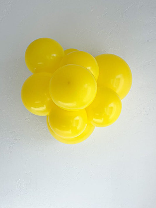 11" Tuftex Yellow - 100Ct.